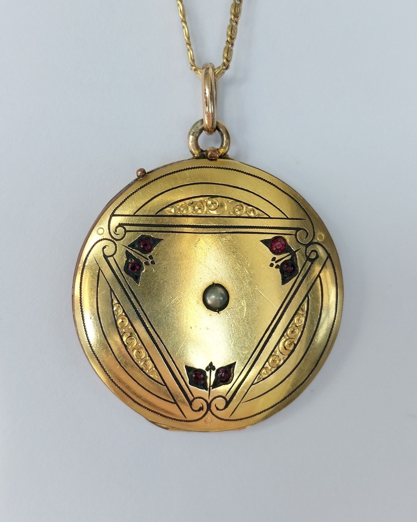 Edwardian gold filled locket with a pearl and ruby pastes