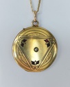 Edwardian gold filled locket with a pearl and ruby pastes