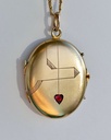 Art Nouveau Gold Locket with faceted Ruby paste in a heart inlay