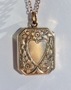Edwardian rose gold locket with heart and buttercup flowers