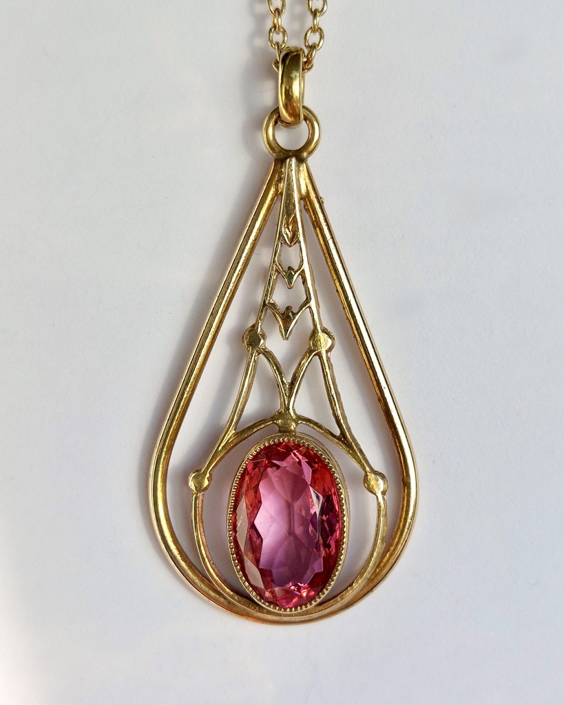 Mid-century drop pendant with a pink stone