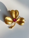 Belle Epoque 18k Gold French Clover Brooch with a Red Stone